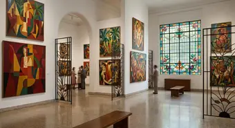 Art gallery with colorful paintings in 1940s Cuban modernist style. Artistic illustration.