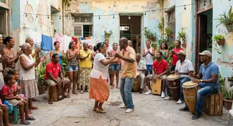 Músicos y bailarines de rumba cubana en un solar habanero con tumbadoras y cajones