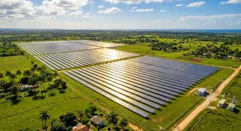Solar photovoltaic farm in Cuba with solar panels under the midday sun