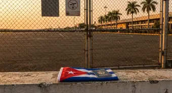 Closed gate at Managua airport symbolizing end of visa-free transit for Cubans