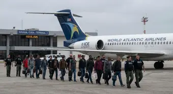ICE deportation flight to Cuba with Cuban migrants at airport