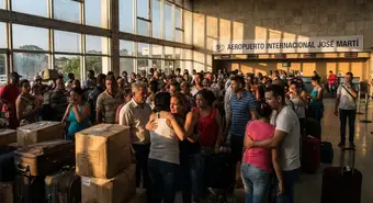 Anxious Cubans at an airport after news of the parole termination