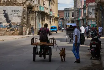 Man on tricycle during blackout in Havana as Cuba faces energy crisis