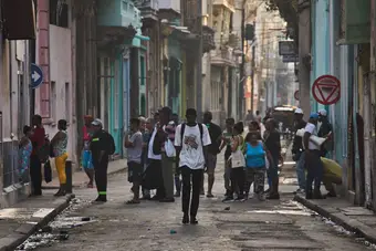 View of a Street in Havana with colonial architecture and economic activity