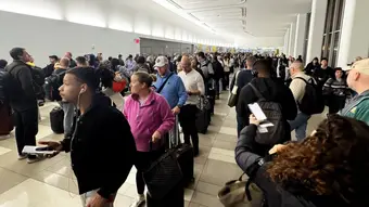 Long lines at LaGuardia airport security checkpoints due to partial government shutdown