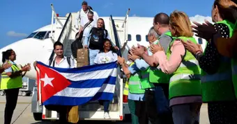 Cuban doctors returning at the airport after finishing their mission in Jamaica