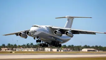A Russian Il-76 military aircraft parked at an airport