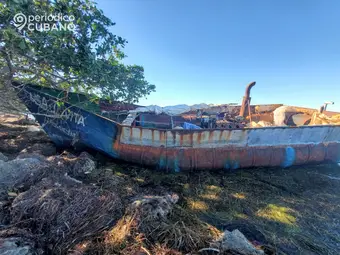 Rustic Cuban rafter boat at sea