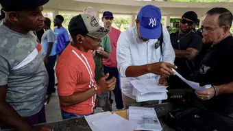 Cuban migrants on Mexico's southern border waiting to resolve their legal status.
