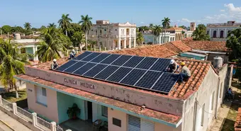 Installation of modern solar panels on a Cuban health clinic