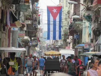 Street in Old Havana with Cubans going about their daily life. Photo: Pexels